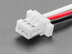 Close-up of 3-pin JST-SH socket connector on cable.